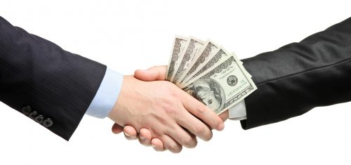 Handshake with money